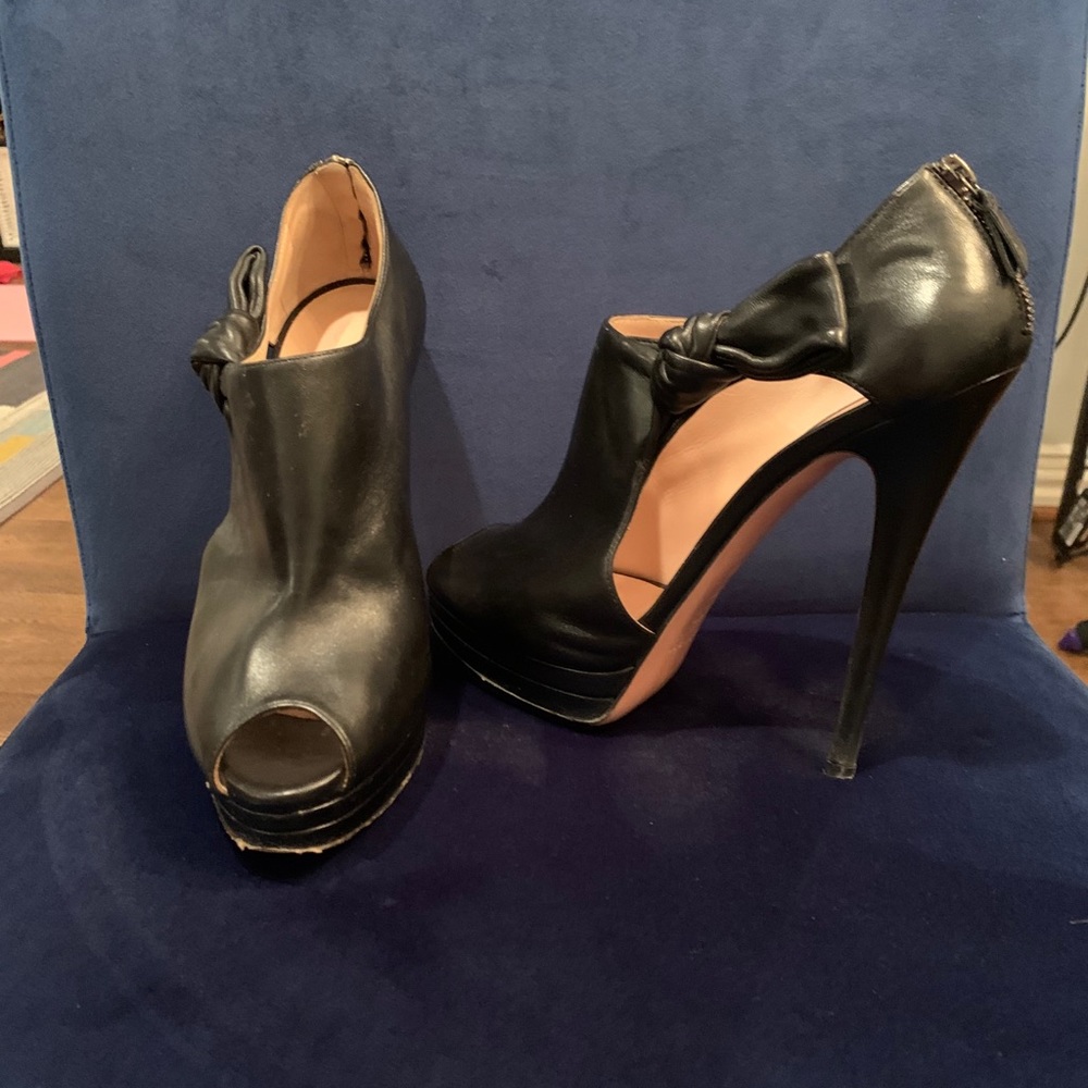Casadei black leather booties with bow